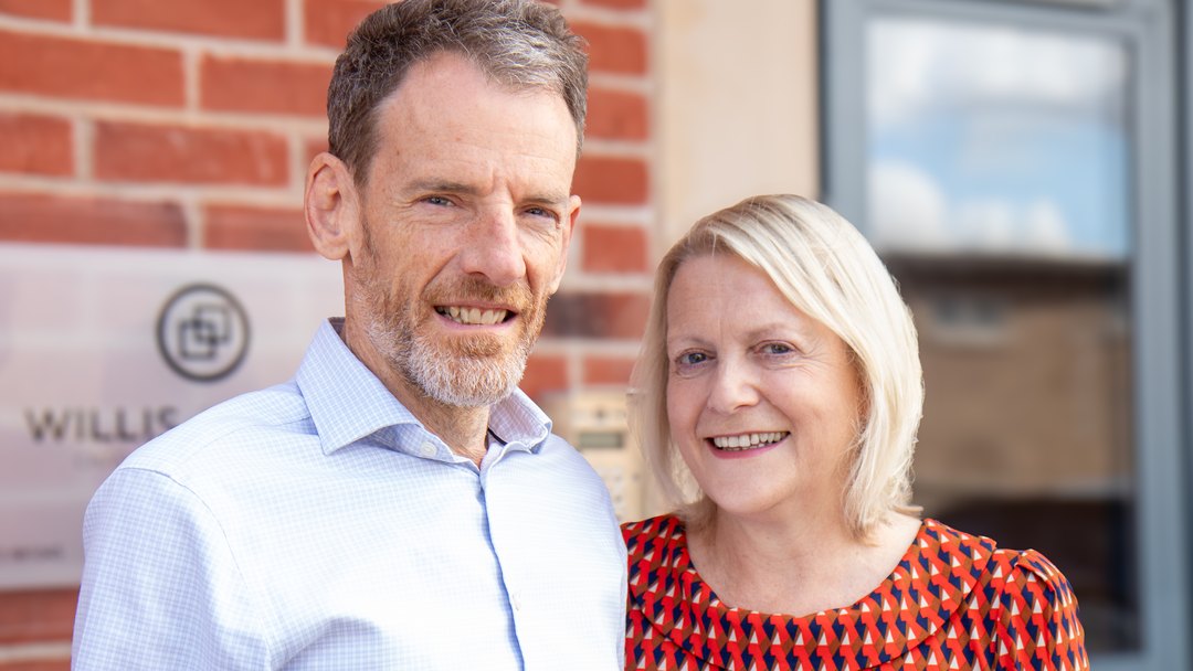 Robert and Julie Cooper outside the Willis Cooper office in Belper